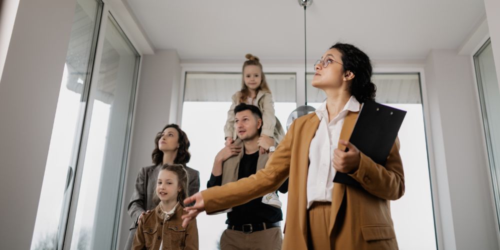 Real estate agent with clients